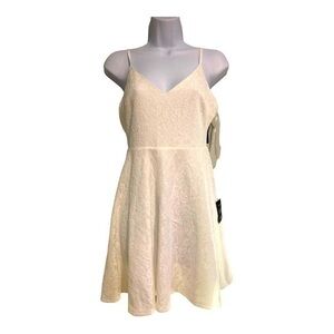 Lulus white spaghetti strap fit and flare party dress.